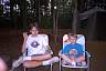 Vincent & Brent in blue chairs at campsite 1997